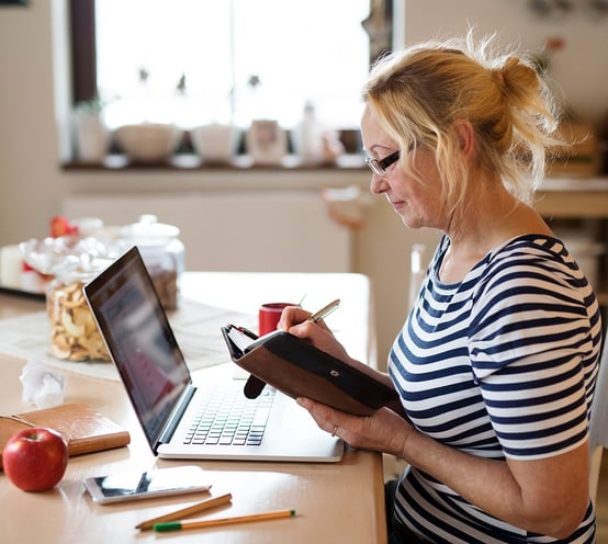 Photo of woman researching online