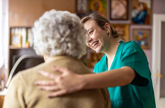 Photo of nurse treating patient